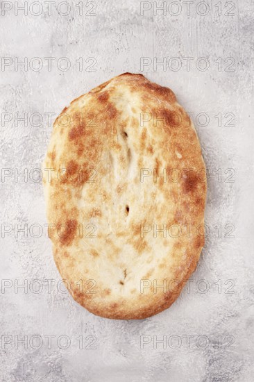 Georgian lavash bread, freshly baked, top view, on the table, no people