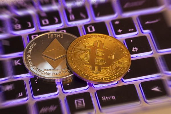 Cryptocurrencies: Close-up of a symbolic Bitcoin and Ethereum