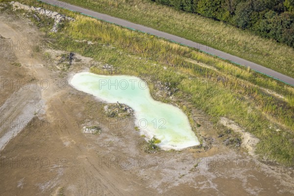 Aerial view, greenish shimmering pond at the landfill Wehofen, Averbruch, Dinslaken, Ruhr area, North Rhine-Westphalia, Germany, DE, Europe, Hanseatic city, aerial view, aerial photography, aerial photography, Lower Rhine, overview, bird's eye view, water, birds-eyes view, overview
