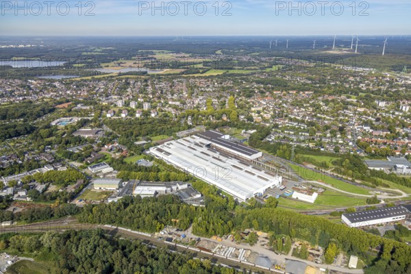 Aerial view, Benteler Steel/Tube GmbH factory premises, view of Bruch and Lohberg district, behind wind turbine plant, Dinslaken, Ruhr area, North Rhine-Westphalia, Germany, alternative energy, DE, Europe, property tax, Hanseatic city, real estate, aerial view, aerial photography, aerial photography, Lower Rhine, overview, bird's-eye view, WTG, wind energy, wind farm, wind power, wind turbine, wind park, wind turbine, wind wheels, residential area, housing and living, residential area, residential quality, residential neighbourhood, housing estate, residential district, birds-eyes view, overview