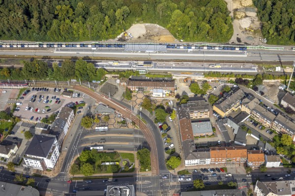 Aerial view, railway station Hbf with new platform and station forecourt, construction site extension and noise barrier, Betuweroute and Betuwe line extension of the railway line, Dinslaken, North Rhine-Westphalia, Germany, railway area, railway tracks, station, station forecourt, railway line, platform, construction work, construction area, construction site, building site, construction project, construction project, construction site, DE, Deutsche Bahn AG, Europe, railway tracks, tracks, Hanseatic city, central station, main station, aerial view, aerial photography, aerial photography, new construction, Lower Rhine, renovation, Ruhr area, redevelopment, overview, bird's-eye view, overview