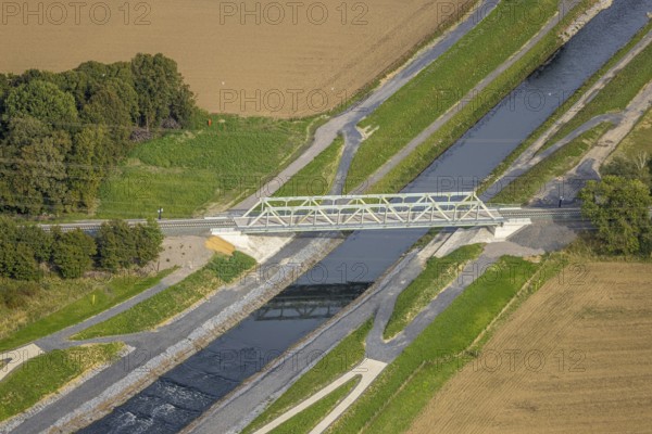 Aerial view, new railway bridge over the river Emschher, river bed, Eppinghoven, Dinslaken, Ruhr area, North Rhine-Westphalia, Germany, construction work, construction area, building site, building plots, construction project, construction site, bridge, DE, Europe, river, river bed, Hanseatic city, aerial view, aerial photography, aerial photography, new construction, Lower Rhine, river bed, overview, bird's eye view, birds-eyes view, overview