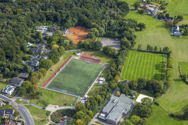 Aerial view, Golddorfarena Sportpark Hünxe, football stadium STV Hünxe sports field and indoor swimming pool, tennis courts tennis association STV Hünxe, Hünxe, Ruhr area, North Rhine-Westphalia, Germany, bathing establishment, bathing resort, DE, Europe, football field, football stadium, indoor swimming pool, aerial view, aerial photography, aerial photography, Lower Rhine, sports, sports facilities, sports field, sports facility, tennis, tennis facility, tennis court, tennis courts, tennis club, overview, bird's-eye view, bird's-eye view, overview