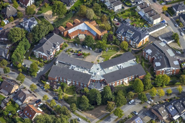 Aerial view, Hewag Seniorenstift GmbH Pflegeheim und evang. Kindergarten Kita, Hünxe, Ruhr area, North Rhine-Westphalia, Germany, retirement home, old people's home, care and nursing, DE, Europe, kindergarten, day care centre, day nursery, day care centre, aerial photograph, aerial photography, aerial photography, Lower Rhine, care facility, retirement home, retirement residence, retirement home, senior centre, overview, bird's-eye view, overview
