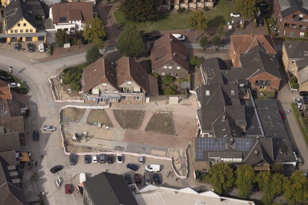 Aerial view, construction site and reconstruction Am Marktplatz, Hünxe, Ruhr area, North Rhine-Westphalia, Germany, construction work, construction area, construction site, building plots, construction project, construction site, DE, Europe, aerial view, aerial photography, aerial photography, Lower Rhine, overview, bird's-eye view, overview