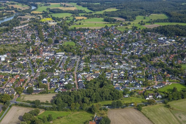 Aerial view, residential area, local view Hünxe general view with distant view, Hünxe, Ruhr area, North Rhine-Westphalia, Germany, DE, Europe, property tax, real estate, aerial view, aerial photography, aerial photography, Lower Rhine, overview, bird's eye view, residential complex, living and living, residential area, quality of living, residential neighbourhood, housing estate, residential area, birds-eyes view, overview