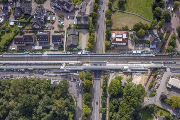 Aerial view, Voerde main station, construction site Steinstraße bridge, construction site pedestrian subway and Bahnhofstraße bridge, extension of the Betuweroute and Betuwe Line railway line, Voerde, Ruhr area, North Rhine-Westphalia, Germany, DE, Europe, aerial view, aerial photography, aerial photography, Lower Rhine, overview, Voerde (Lower Rhine), bird's-eye view, birds-eyes view, overview