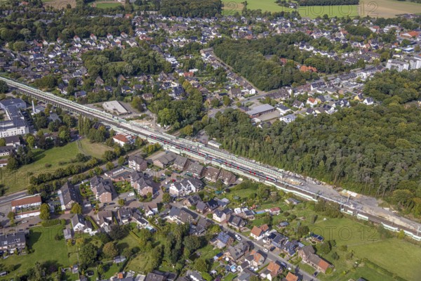 Aerial view, Voerde main station, construction site Steinstraße bridge, construction site pedestrian subway and Bahnhofstraße bridge, extension of the Betuweroute and Betuwe Line railway line, Voerde, Ruhr area, North Rhine-Westphalia, Germany, DE, Europe, aerial view, aerial photography, aerial photography, Lower Rhine, overview, Voerde (Lower Rhine), bird's-eye view, birds-eyes view, overview