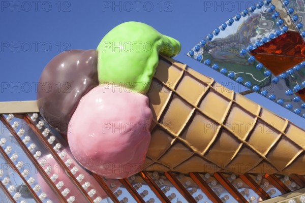 Ice cream cone with colourful ice cream scoops as decoration at the Bremer Osterwiese folk festival, Bürgerweide, Bremen, Germany