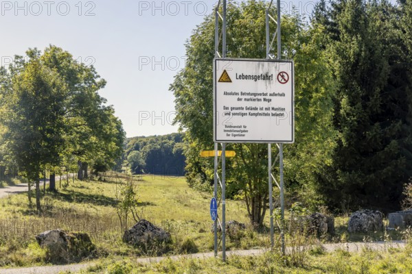 Danger to life from unexploded ordnance in the Swabian Alb biosphere reserve. Landscape of the Alb in autumn. An important component is the former military training area in Münsingen, which is located in the centre of the reserve. The 85, 270-hectare biosphere reserve was established by the state of Baden-Württemberg in 2008. It has been a UNESCO biosphere reserve since 2009. Münsingen, Baden-Württemberg, Germany