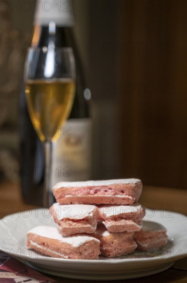 The Biscuit Rise de Reims is a crispy, airy, pink-coloured, very fragile patisserie speciality from the northern French city of Reims, which has been dipped in Champagne since around 1690 and has been enjoyed by rulers such as King Charles V, Reims, Champagne, Marne department, Grand Est region, France
