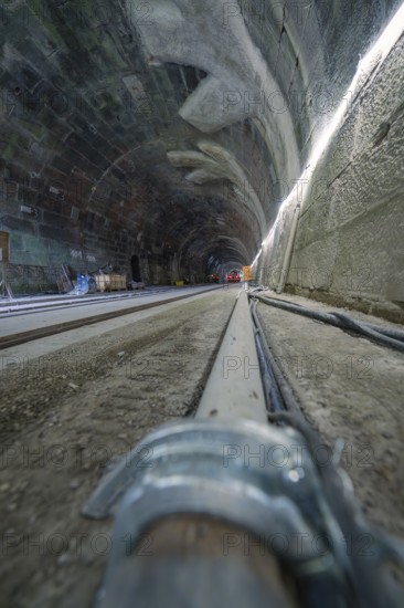 Rough tunnel construction with railway tracks from a low perspective, construction of the Hermann Hesse railway, Calw, Black Forest, Germany