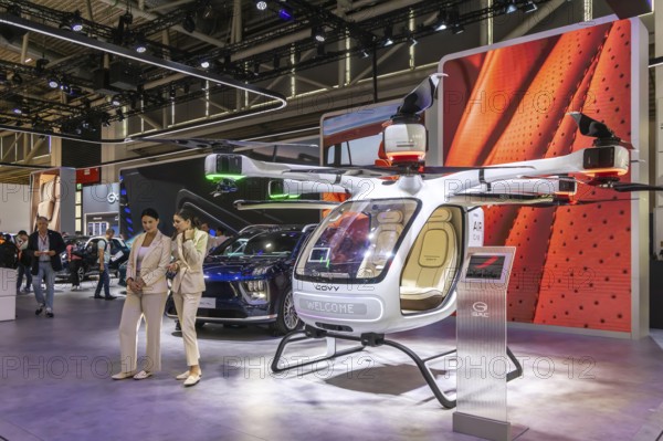 Exhibition stand of the Chinese manufacturer GAC, Guangzhou Automobile Group. Govy air taxi. Model Hyptec HL. IAA MOBILITY in Munich. The motor show presents itself as a holistic mobility trade fair. Cars continue to take centre stage, however, and Chinese manufacturers are gaining ground. Munich, Bavaria, Germany