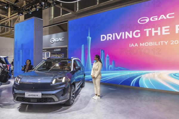 Exhibition stand of the Chinese manufacturer GAC, Guangzhou Automobile Group. Model Aion V. IAA MOBILITY in Munich. The motor show presents itself as a holistic mobility trade fair. Cars continue to take centre stage, however, and Chinese manufacturers are gaining ground. Munich, Bavaria, Germany