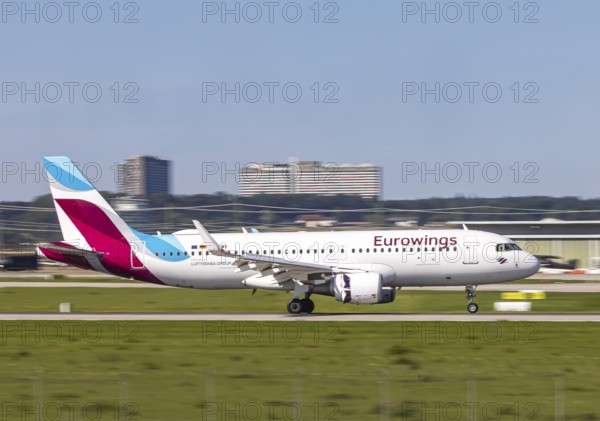 Stuttgart Airport with aircraft on landing. Aircraft registration: D-AEWK, Eurowings, Airbus A320-200, Stuttgart, Baden-Württemberg, Germany