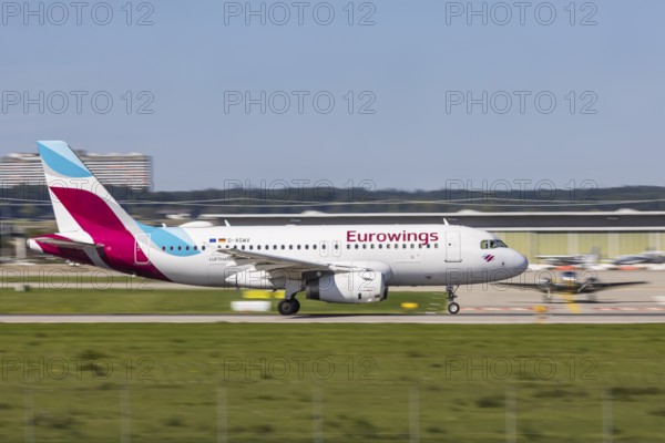 Stuttgart Airport with aircraft on the runway. Aircraft registration number: D-AGWV, Eurowings, Airbus A319-100, Stuttgart, Baden-Württemberg, Germany