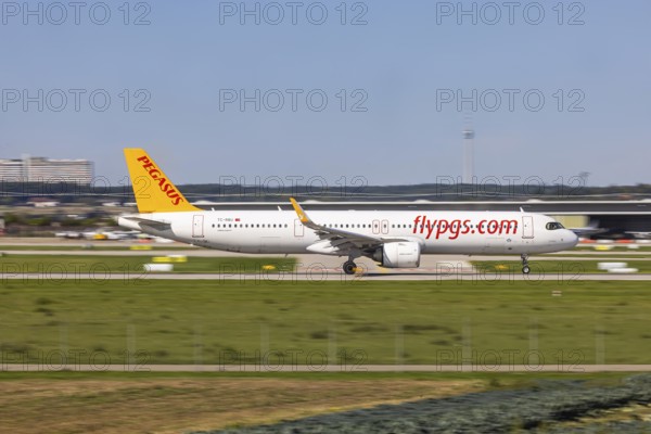 Stuttgart Airport with television tower and aeroplane on the runway. Aircraft registration number: TC-RBU, Pegasus, Airbus A321neo. Stuttgart, Baden-Württemberg, Germany