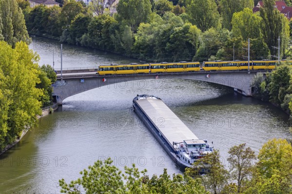 Neckar bridge in Stuttgart with SSB tram. The 105 metre long cargo ship ANNABELL on its way to the port of Stuttgart, Baden-Württemberg, Germany
