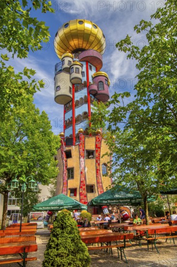 Beer garden of the Kuchlbauer brewery in front of the Kuchlbauer tower by architect Friedensreich Hundertwasser, Abensberg, Lower Bavaria, Bavaria, Germany