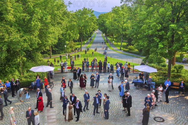 Forecourt of the festival theatre on the Green Hill with festival guests and the driveway avenue, festival city of Bayreuth, Upper Franconia, Franconia, Bavaria, Germany