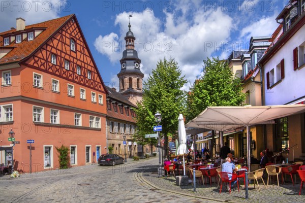 Half-timbered house with street café and hospital church in the old town, beer town Kulmbach, Maintal, Upper Franconia, Franconia, Bavaria, Germany