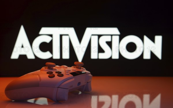 Dhaka, Bangladesh- 23 Sep 2025: Game controller in front of Activision logo on a background