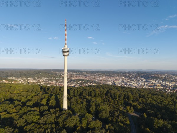 The television tower dominates the landscape with dense forest and an urban panorama in the background, Stuttgart, Baden-Württemberg, Germany