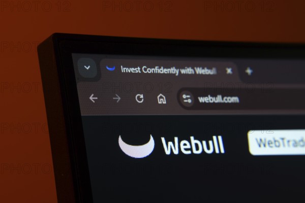 Dhaka, Bangladesh- 02 June 2025: Close-up of a computer screen displaying the webull web interface in dark mode