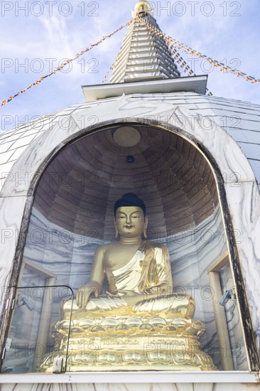 Golden Buddha statue in a stupa, meditating, surrounded by glass protection, Stupa am Wagram Grafenwörth Weinviertel Lower Austria Austria
