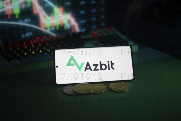 Azbit logo with coins and trading charts illuminated by green lighting