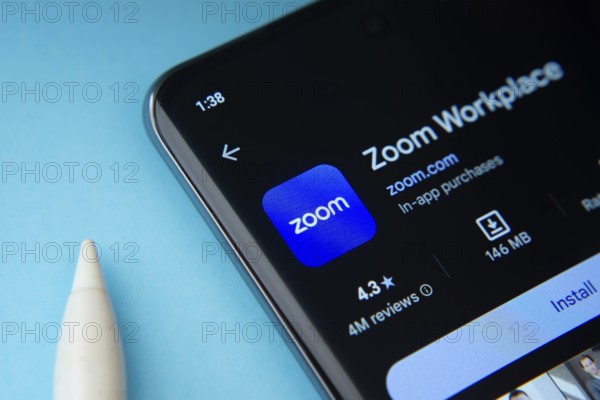 Dhaka, Bangladesh- 16 March 2025: The zoom app from Google Playstore is displayed on a smartphone screen