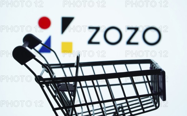 Dhaka, Bangladesh- 03 July 2025: Silhouette of a shopping cart in front of the ZOZO logo, symbolizing ecommerce and online shopping