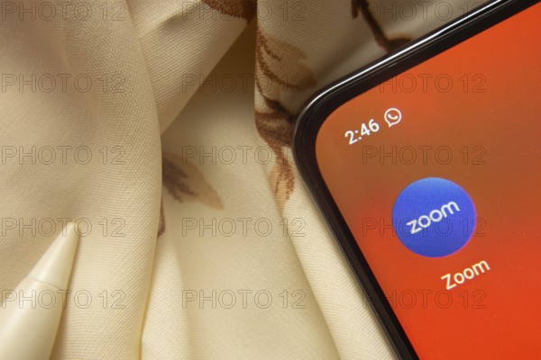 Dhaka, Bangladesh- 07 May 2025: Zoom app icon is seen on smartphone
