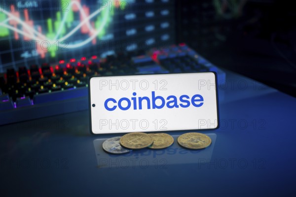 Coinbase logo on smartphone with coins, blue neon lights, and trading charts in background