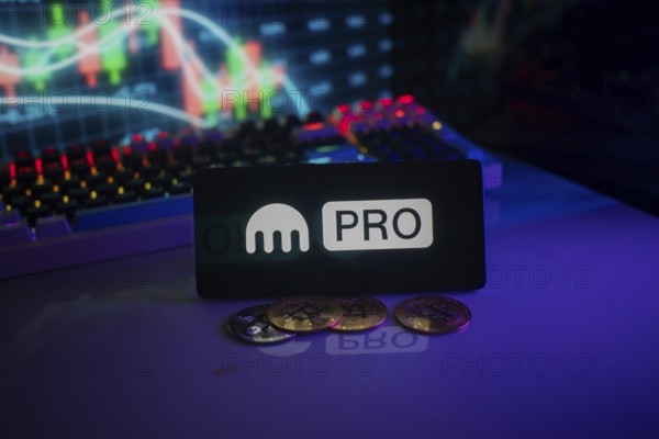 Kraken's PRO logo amid cryptocurrency coins and glowing market graph