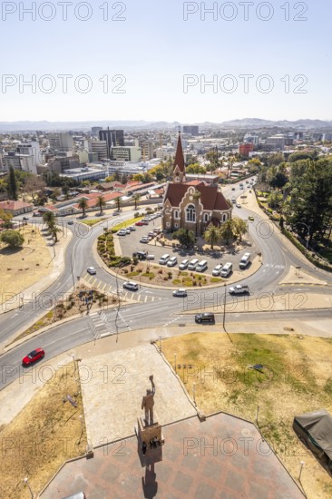 The bronze statue of Dr. Sam Nujoma and Christuskirche is a historic Lutheran church in Windhoek, Namibia - 11 August, 2025