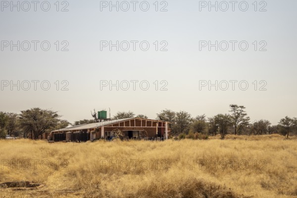 Outjo is a quiet Namibian town surrounded by savannas and hills, with dry sunny nature, calm daily life and with amazing houses