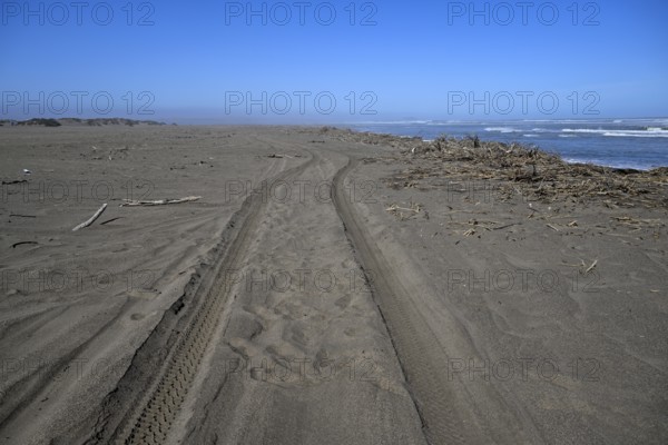 Beach on the Atlantic Ocean near Oranjemund, diamond restricted area, Karas region, Namibia