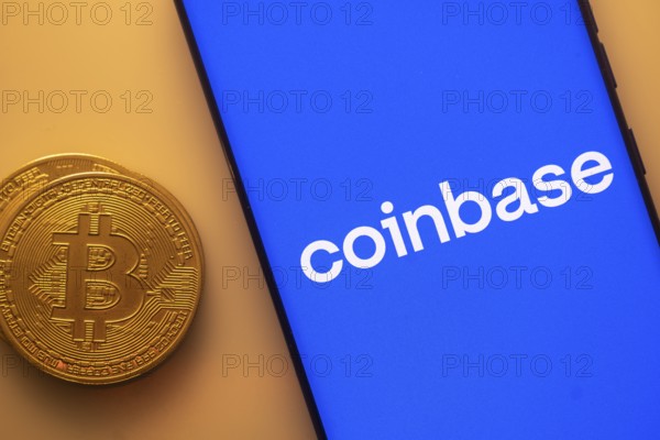 Coinbase screen with Bitcoin coin, representing cryptocurrency exchange platform