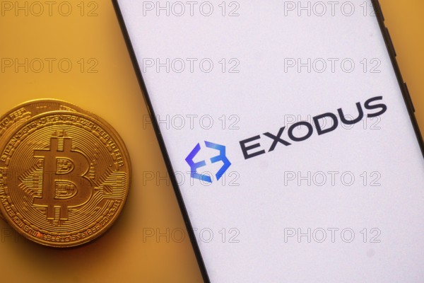 Exodus logo on white screen alongside Bitcoin coin, related to crypto wallet