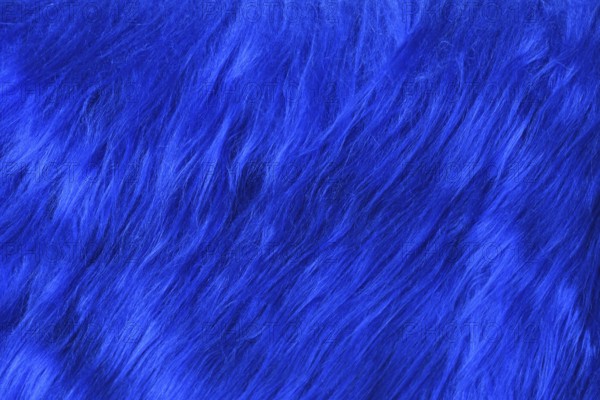 Close up of bright blue synthetic fake fur