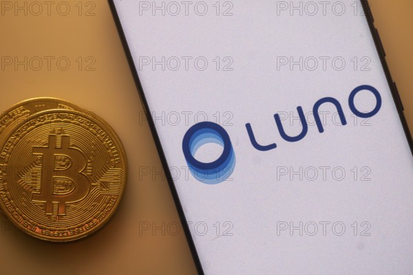 Bitcoin coin next to Luno logo on a white backdrop, indicating cryptocurrency exchange