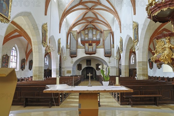 View of the altar and organ from the centre of the church, decorative vaults and artistic design, St. Stephan's parish church in Tulln Lower Austria Austria