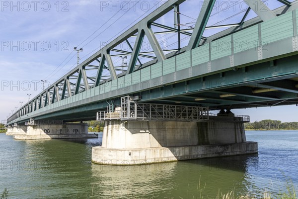 Modern metal bridge over a river with solid architecture and wet structures, old Danube bridge Tulln Lower Austria Austria