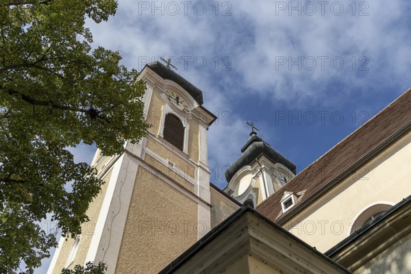 Baroque church towers with clocks against a blue sky, Gothic architectural details, St Stephan's parish church in Tulln Lower Austria Austria