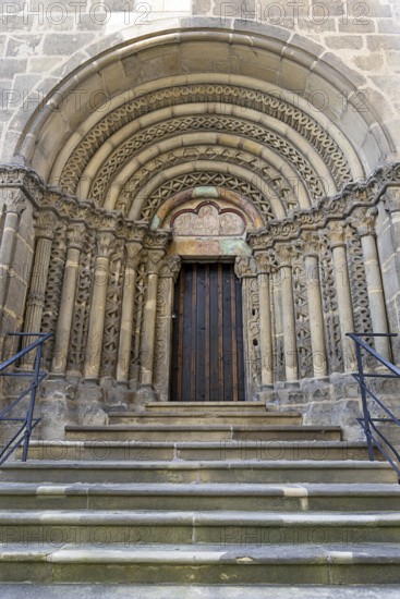 Romanesque stone door, carner with detailed decorations, symmetrically constructed, with stairs, parish church St.Stephan Tulln Lower Austria Austria