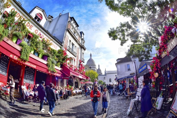 Place du Tertre in the Parisian artists' quarter of Montmartre in Paris, with the Sacre Coeur church in the background, France