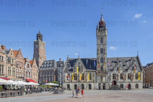 City hall with belfry, restaurants and pavement cafes on Market Square in historic town centre of Dendermonde, Termont, East Flanders, Belgium
