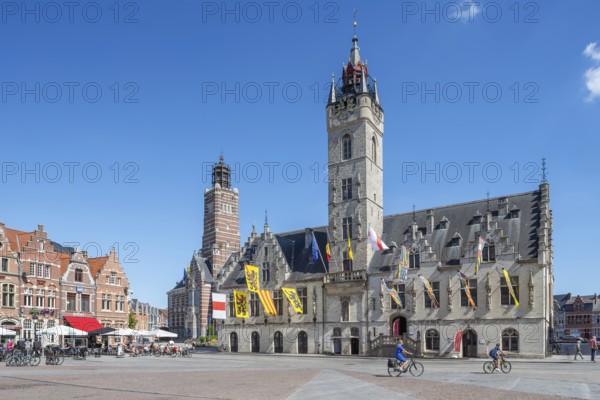 City hall with belfry, restaurants and pavement cafes on Market Square in historic town centre of Dendermonde, Termont, East Flanders, Belgium