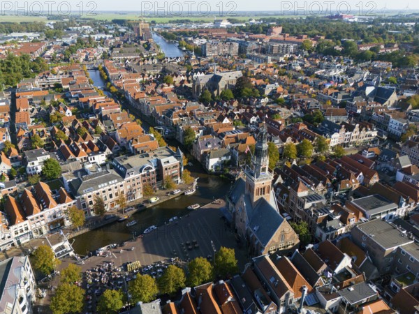 Expansive city view with a central church tower and neighbouring houses, aerial view, former city weigh house, market square, Alkmaar, Alkmar, Noord-Holland, North Holland, Netherlands